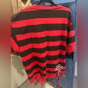 Wrong size, couldn’t return. Never worn. Haculla Black and red, Size M.